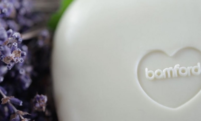 A white bamford soap and a bunch of lavender